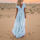 Vestido boêmio de bolinhas para praia e férias